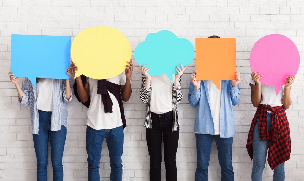 People holding blank speech bubbles